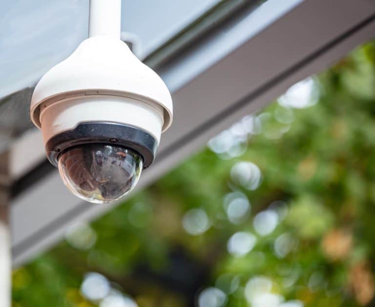surveillance-cctv-security-camera-on-the-roof-clo-2022-12-16-12-21-24-utc